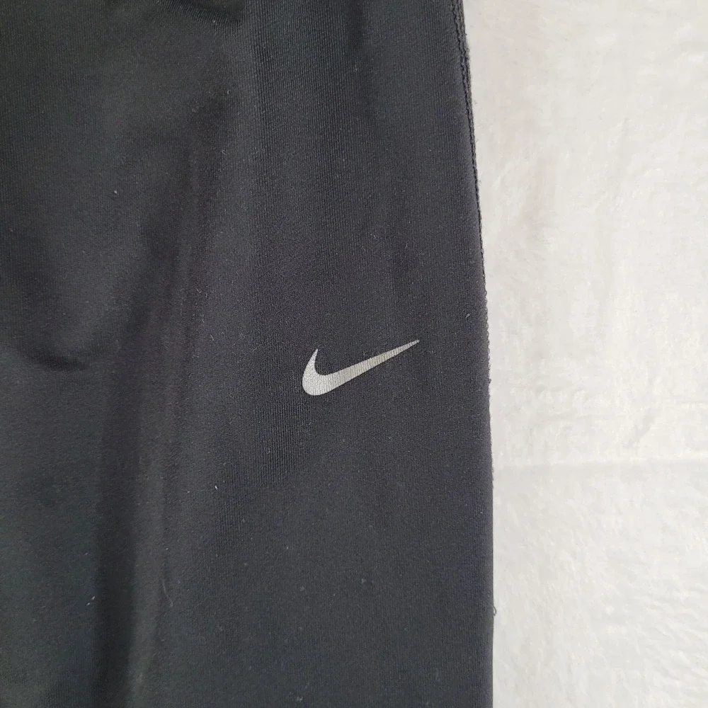 Nike Dri Fit Womens Black Running Athletic Pants Zip Ankle M